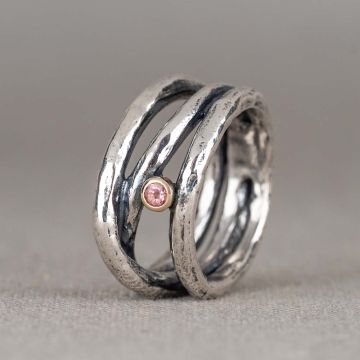 Ring zilver gedraaid + 10K + Roze Toermalijn